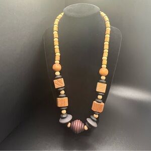 Chunky Wooden Beaded Necklace with a barrel clasp. 1980’s